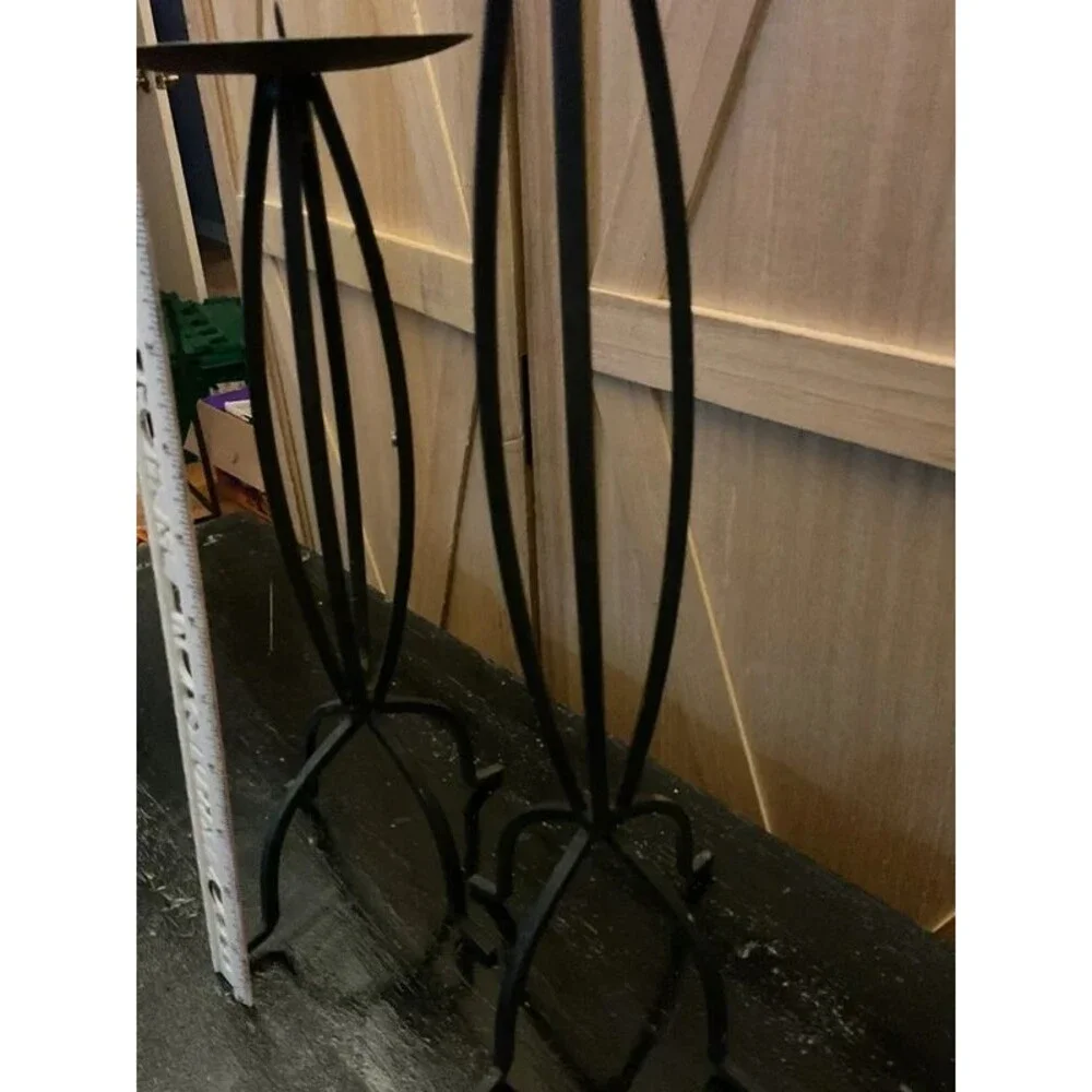 Set of black metal candle holders